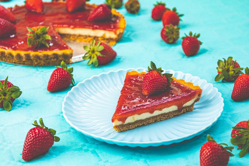 Fresh berry cheesecake slice dessert