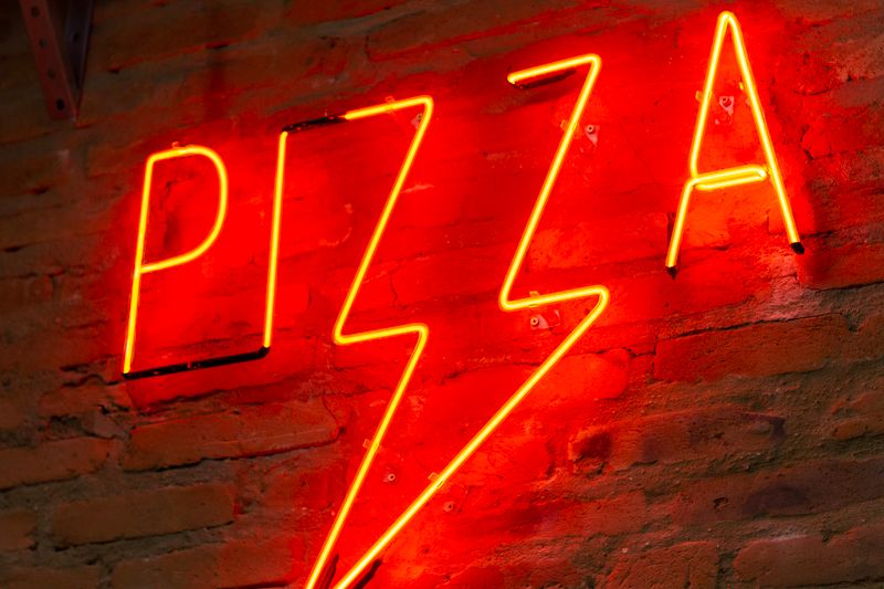 Pizza inn restaurant interior — warm atmosphere and handcrafted pizza