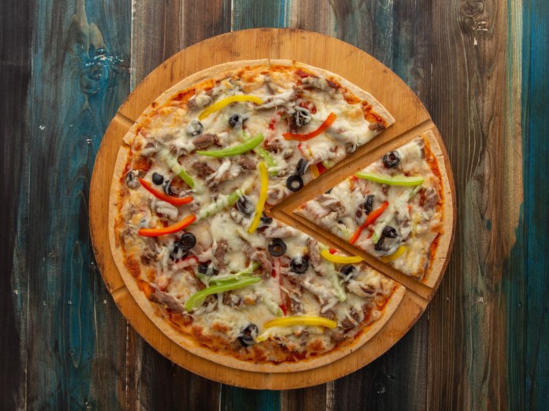 Meat Lovers supreme pizza with sausage salami and beef