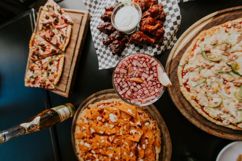 The Texan BBQ pizza inn signature pie with smoked brisket and jalapeños